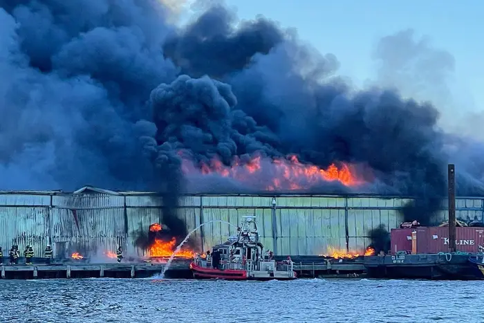 A fire rips through an NYPD warehouse facility, where e-bikes, motor vehicles and historic vehicles are held. It's unclear what caused the fire.